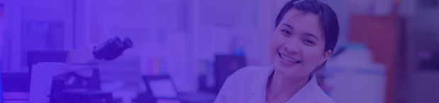 GoldBio new lab startup program banner - lady scientist by microscope